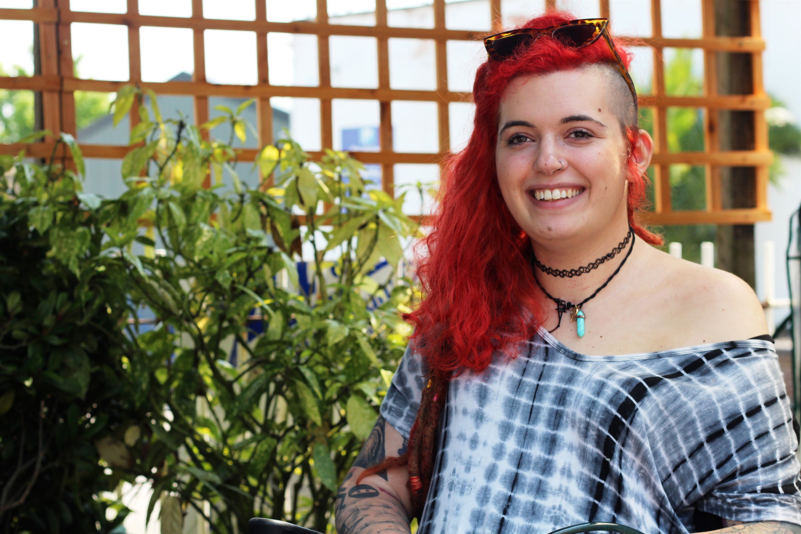 Young woman with red hair in the AFK garden