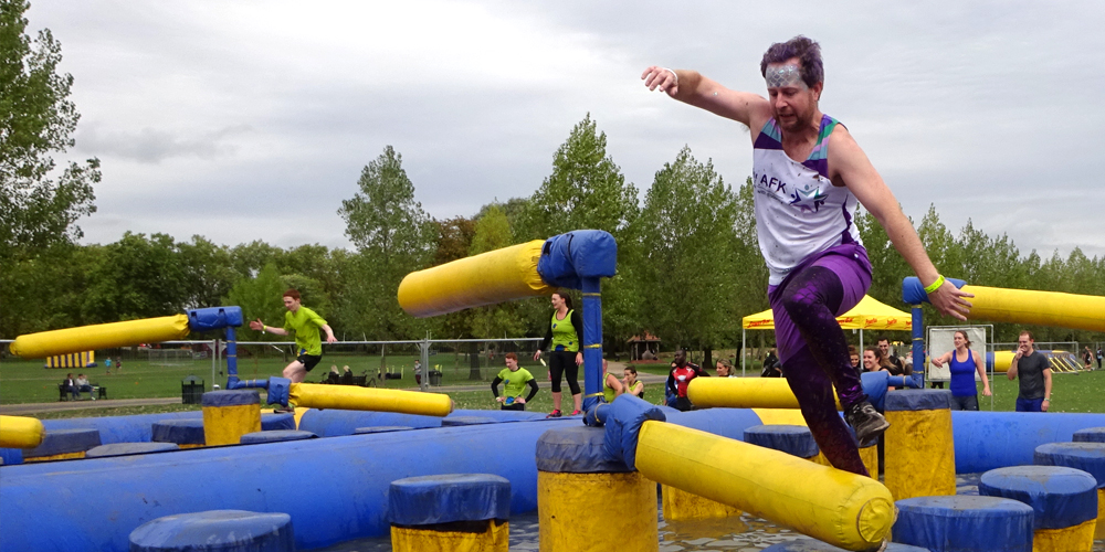 Man completing the rough runner challenge