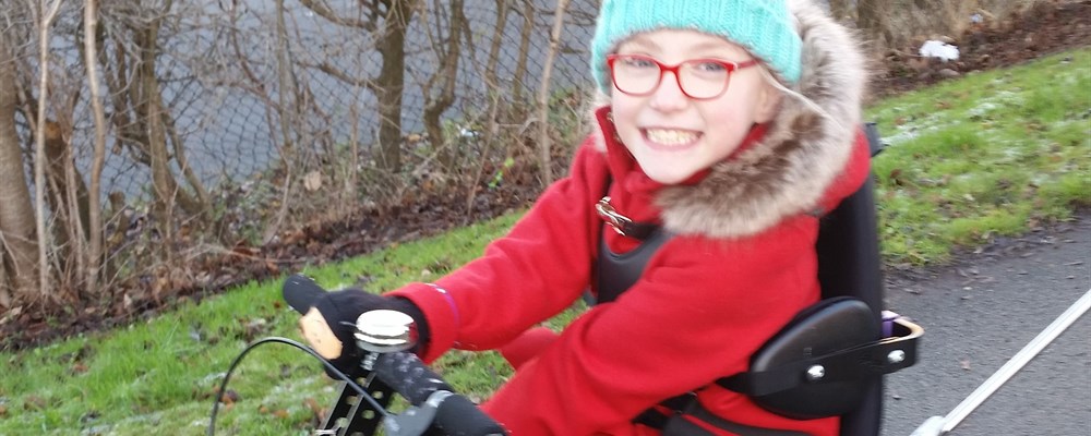 Girl in her trike