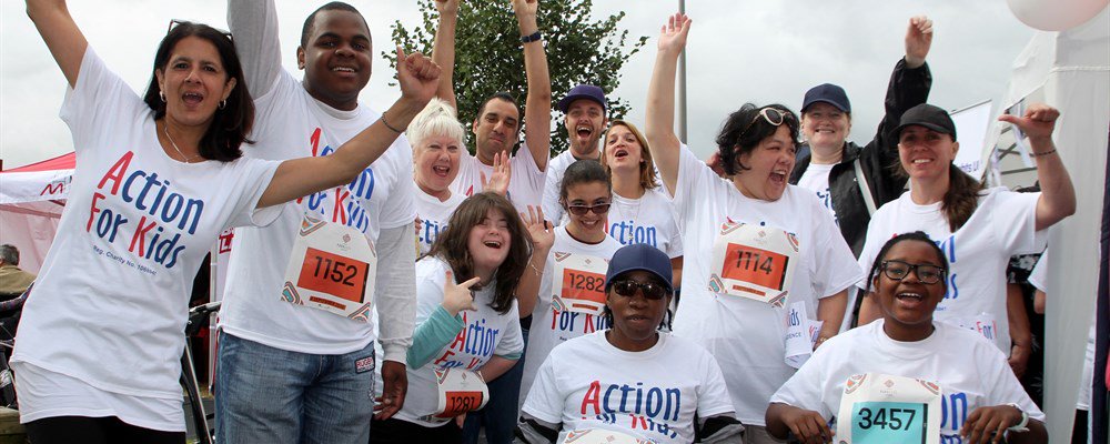 Large group posing at fundraiser