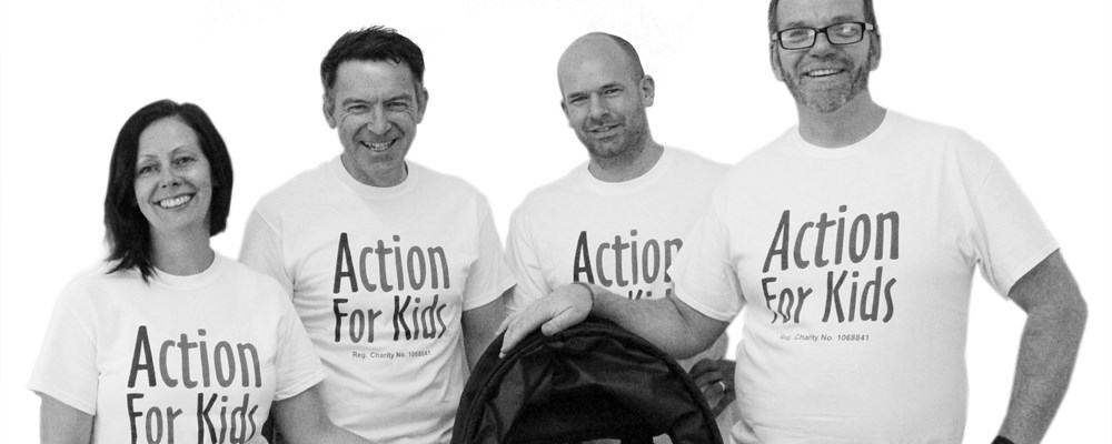 Staff members posing in black and white photograph