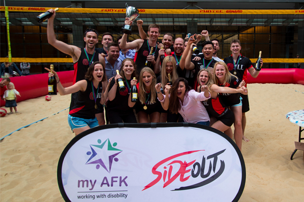 bvb champs Beach volleyball championship team celebrate with a trophy