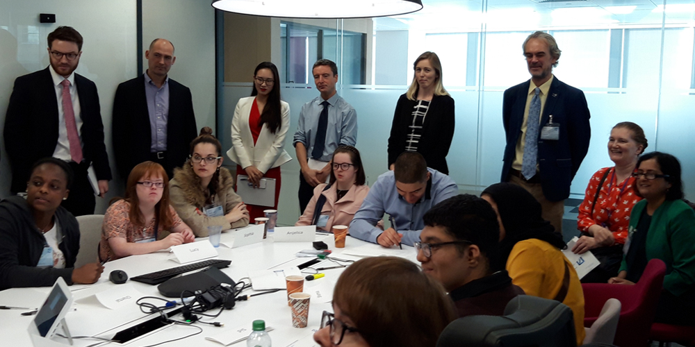 Group sitting around a conference table