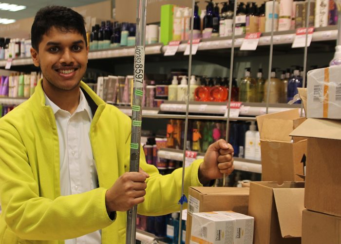 Trainee Neal at work in Waitrose