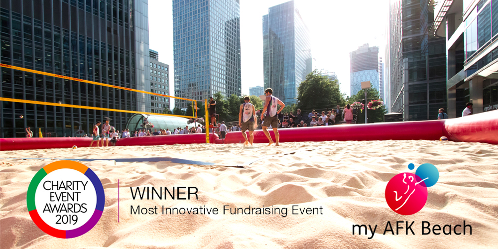 Urban beach volleyball court with AFK Beach logo and Charity Event Award winners logo