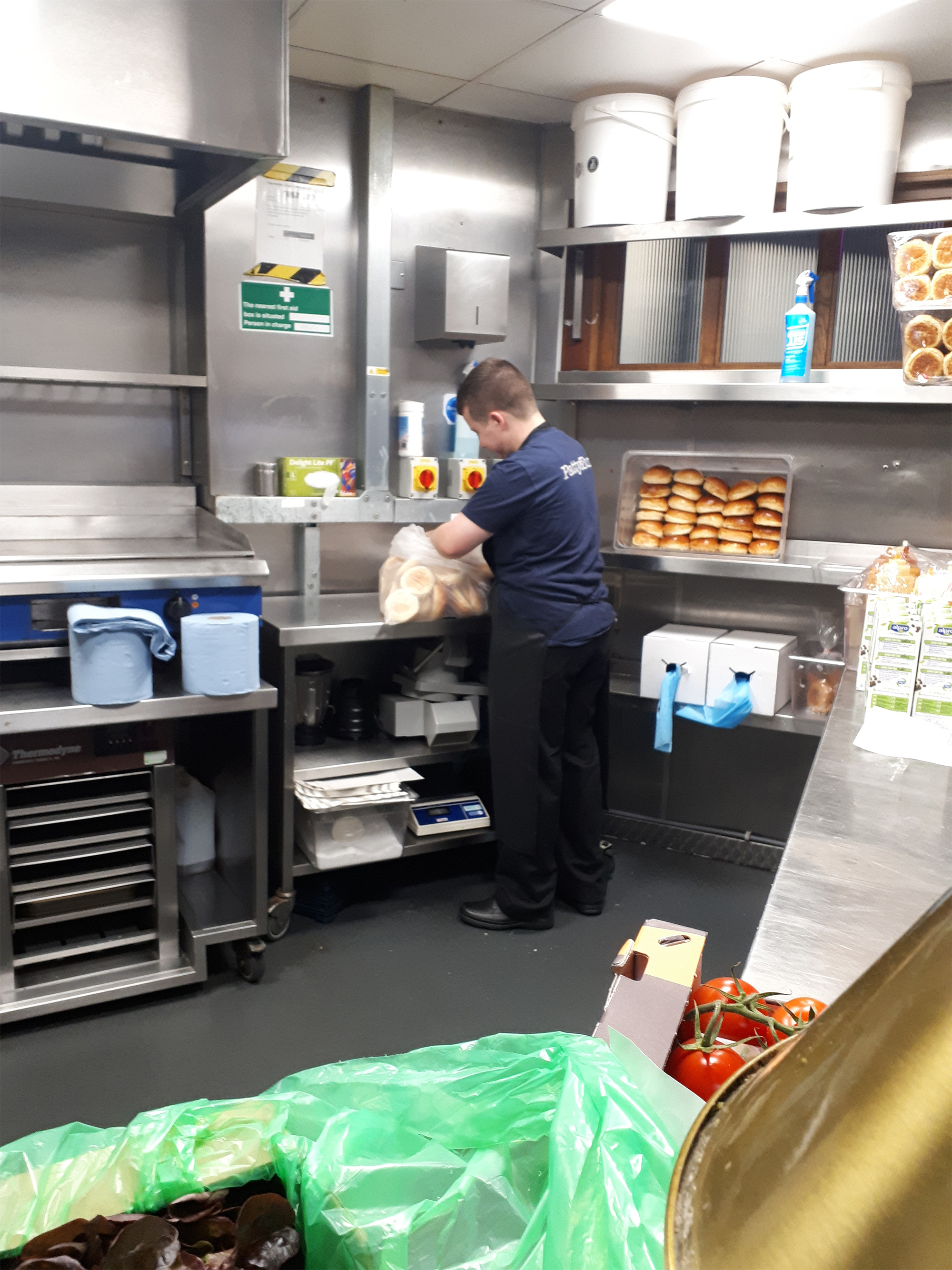 Young man working in a kitchen