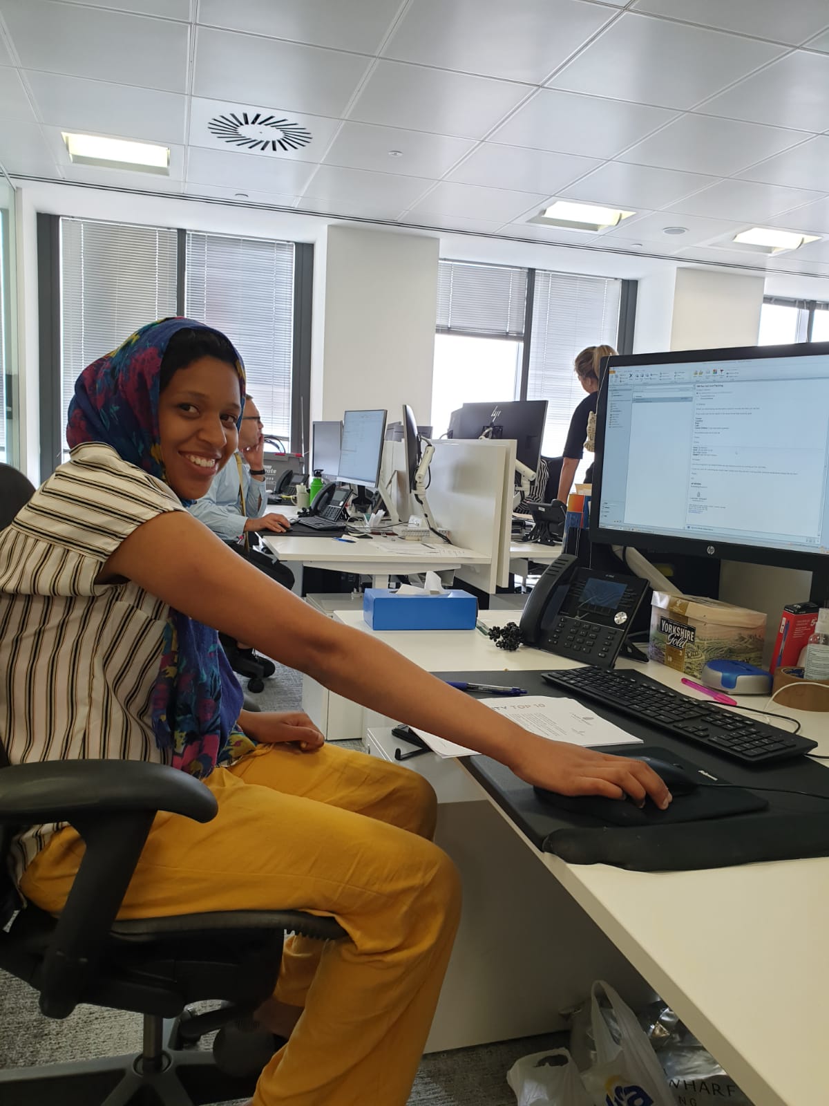 Young woman at a computer desk