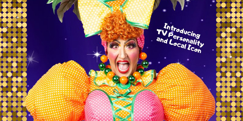 paul dressed as a dame with a ginger curly wig