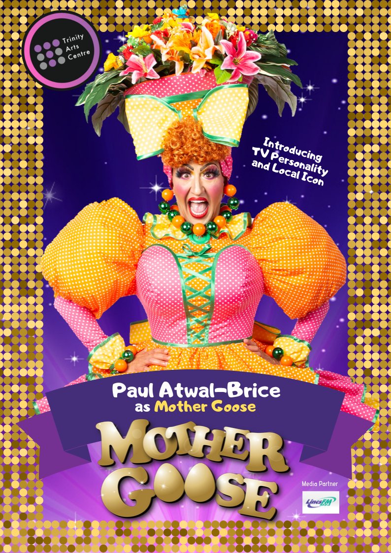 a picture of paul dressed as a dame in a pantomime called mother goose
