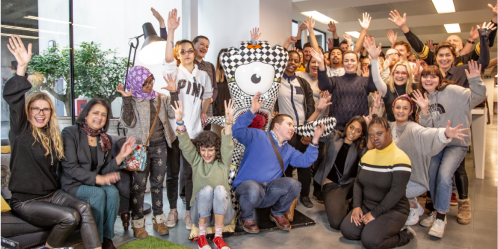 Group of corporate volunteers and AFK trainees