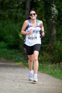 woman running on track