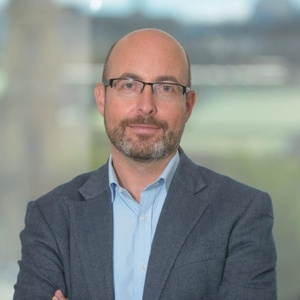 Man smiling with glasses