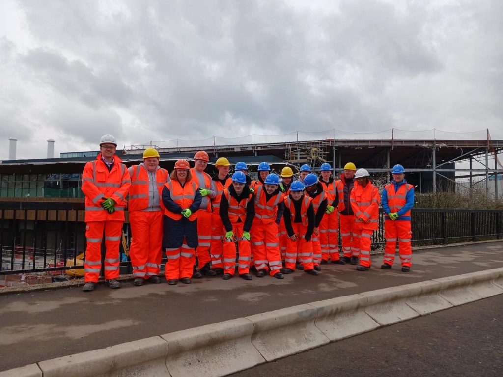 group of people in hard hats on a construction site